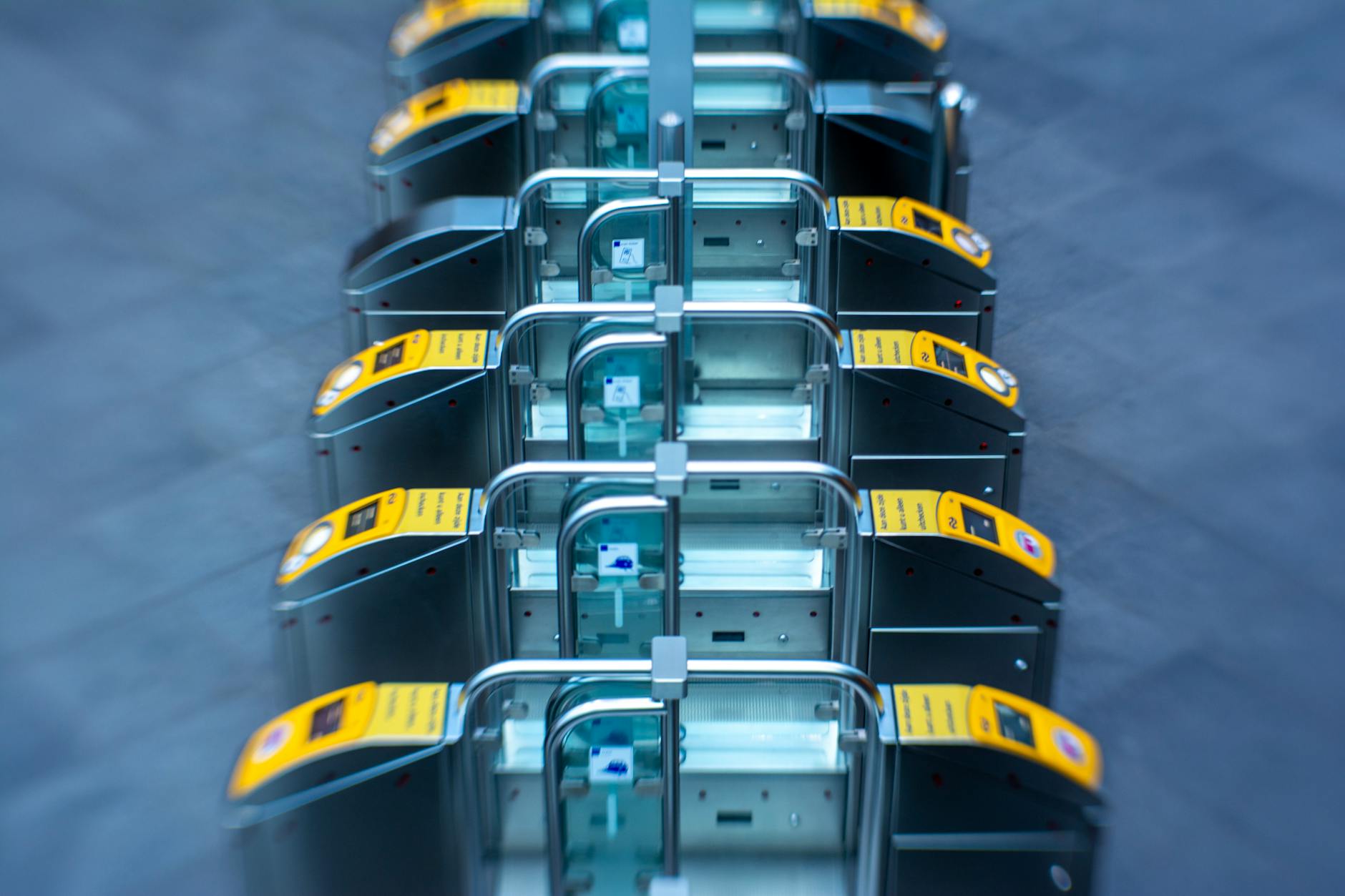 Elevated view of subway turnstiles showing modern transportation infrastructure. (Photo by Jan van der Wolf on Pexels)