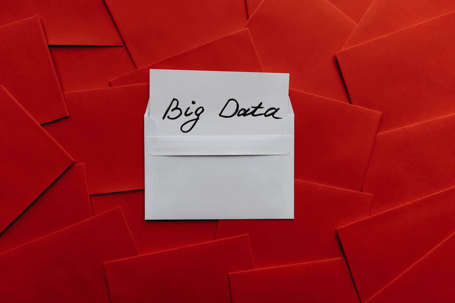 White envelope with 'Big Data' text on red envelope background. Conceptual digital imagery. (Photo by alleksana on Pexels)