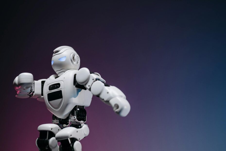 Close-up of a futuristic robotic toy against a gradient background, symbolizing innovation and te... (Photo by Pavel Danilyuk on Pexels)